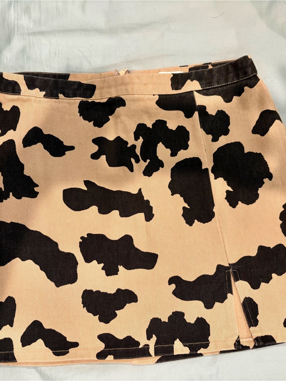 Le Lis Black and Tan Cow-Print Mini Skirt